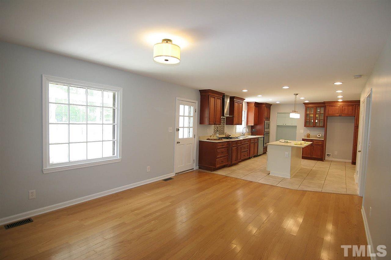 7801 Audubon Drive Raleigh, NC 27615 - Photo 9 of 25 a view of kitchen and window