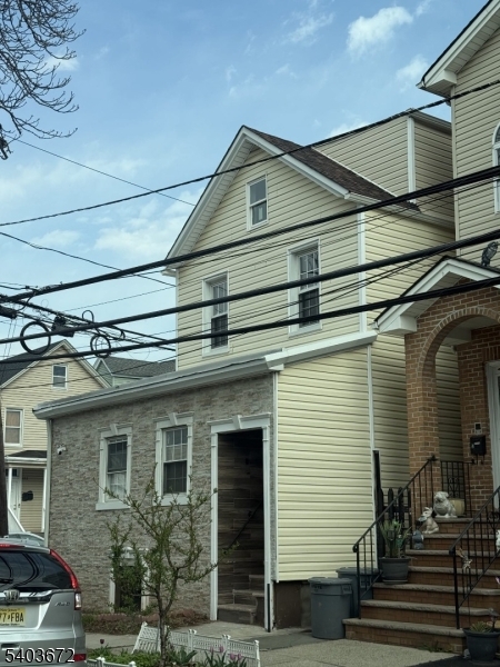 863 Lafayette Street Elizabeth, NJ 07201 - Photo 1 of 20 a front view of a house