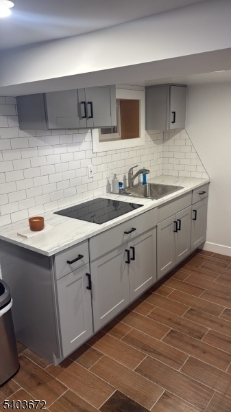 863 Lafayette Street Elizabeth, NJ 07201 - Photo 20 of 20 a kitchen with a sink and cabinets