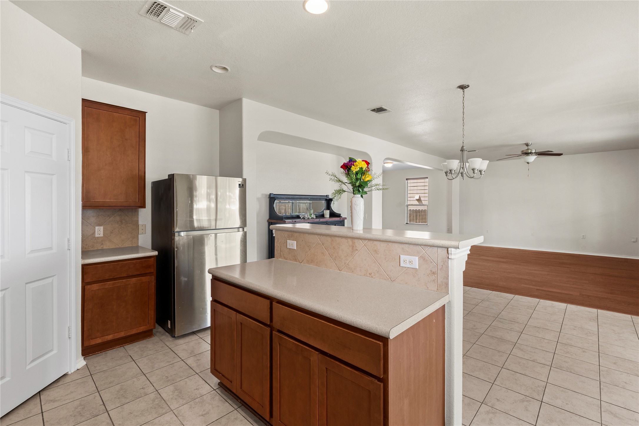 8613 Capitol View Drive Austin, TX 78747 - Photo 22 of 33 A well-appointed kitchen features stainless steel appliances and a convenient island with a breakfast bar.