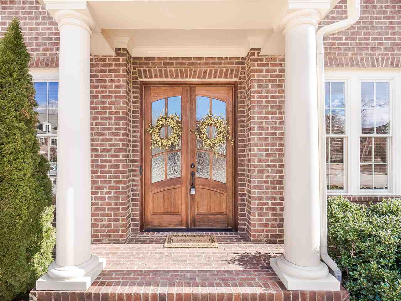 3004 Royal Forrest Drive Raleigh, NC 27614 - Photo 1 of 25 Welcome to 3004 Royal Forrest Dr. Beautiful columns frame the amazing grand solid wood double front doors with rain water glass for privacy. Moving furniture in will be easy with both doors opening. Notice the crown moulding trim over the front doors. Exterior Front