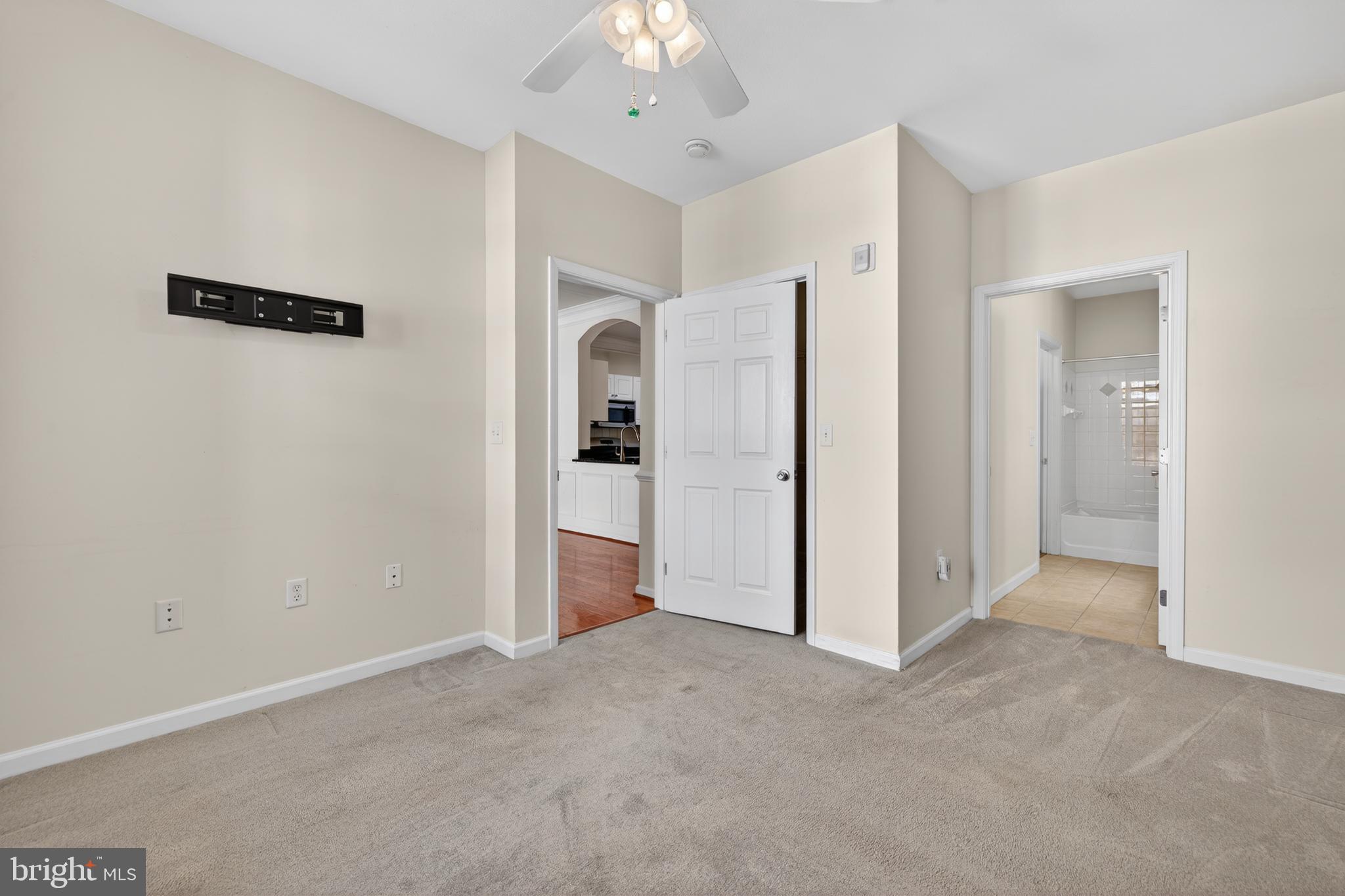 31 Booth Street, Unit 358 Gaithersburg, MD 20878 - Photo 13 of 20 a view of a hallway with a white walls