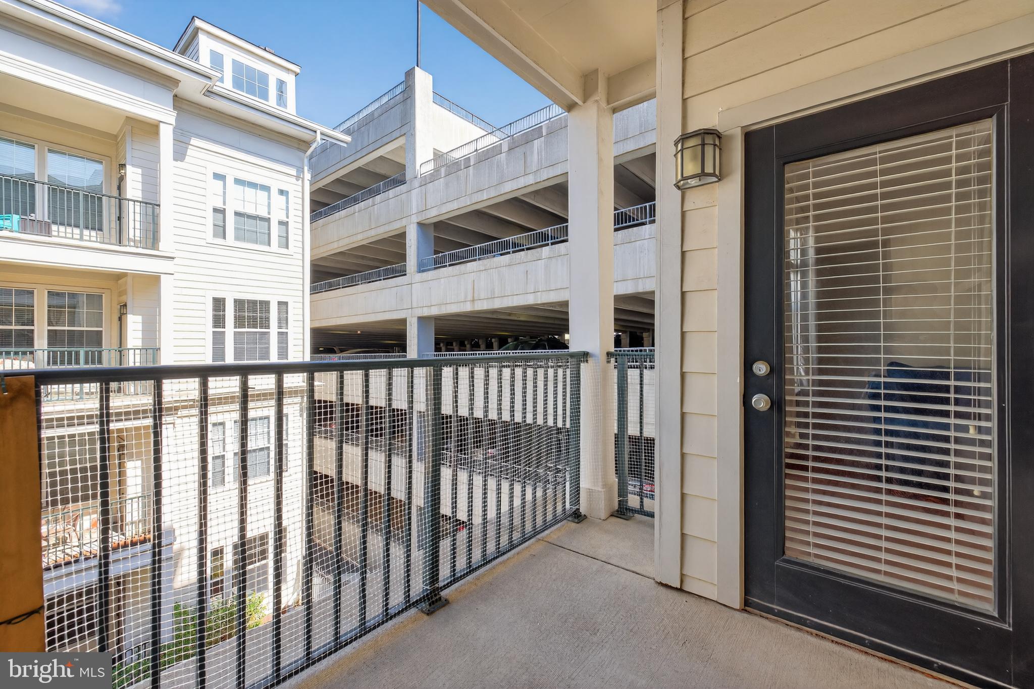 31 Booth Street, Unit 358 Gaithersburg, MD 20878 - Photo 19 of 20 a view of a balcony with a window