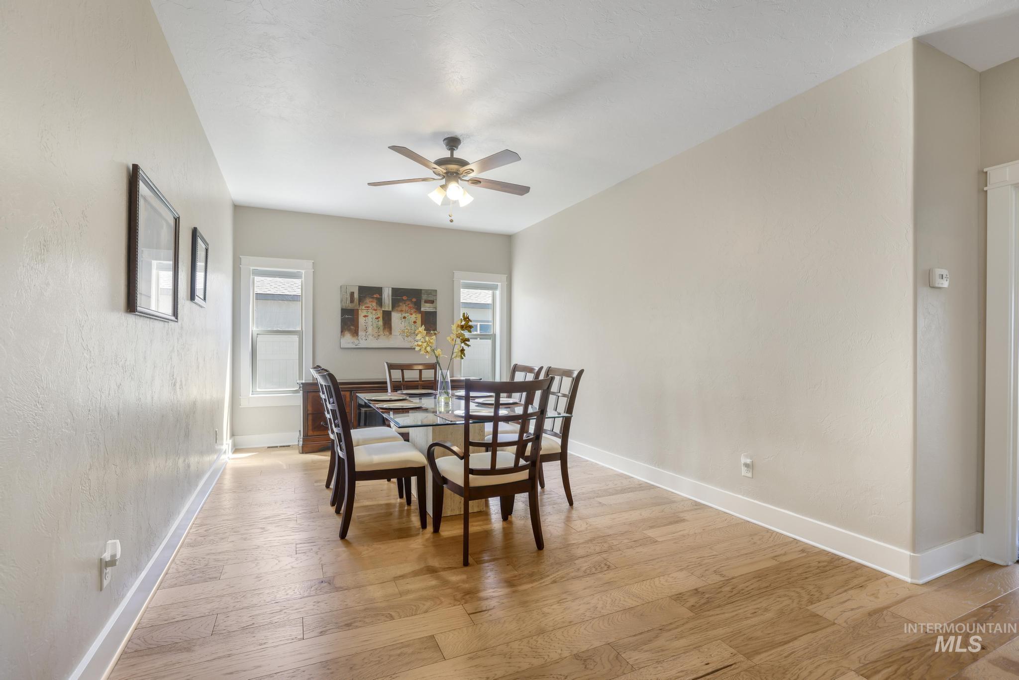 2157 Cayuse Street Twin Falls, ID 83301 - Photo 19 of 48 Dining space featuring light wood finished floors and a ceiling fan