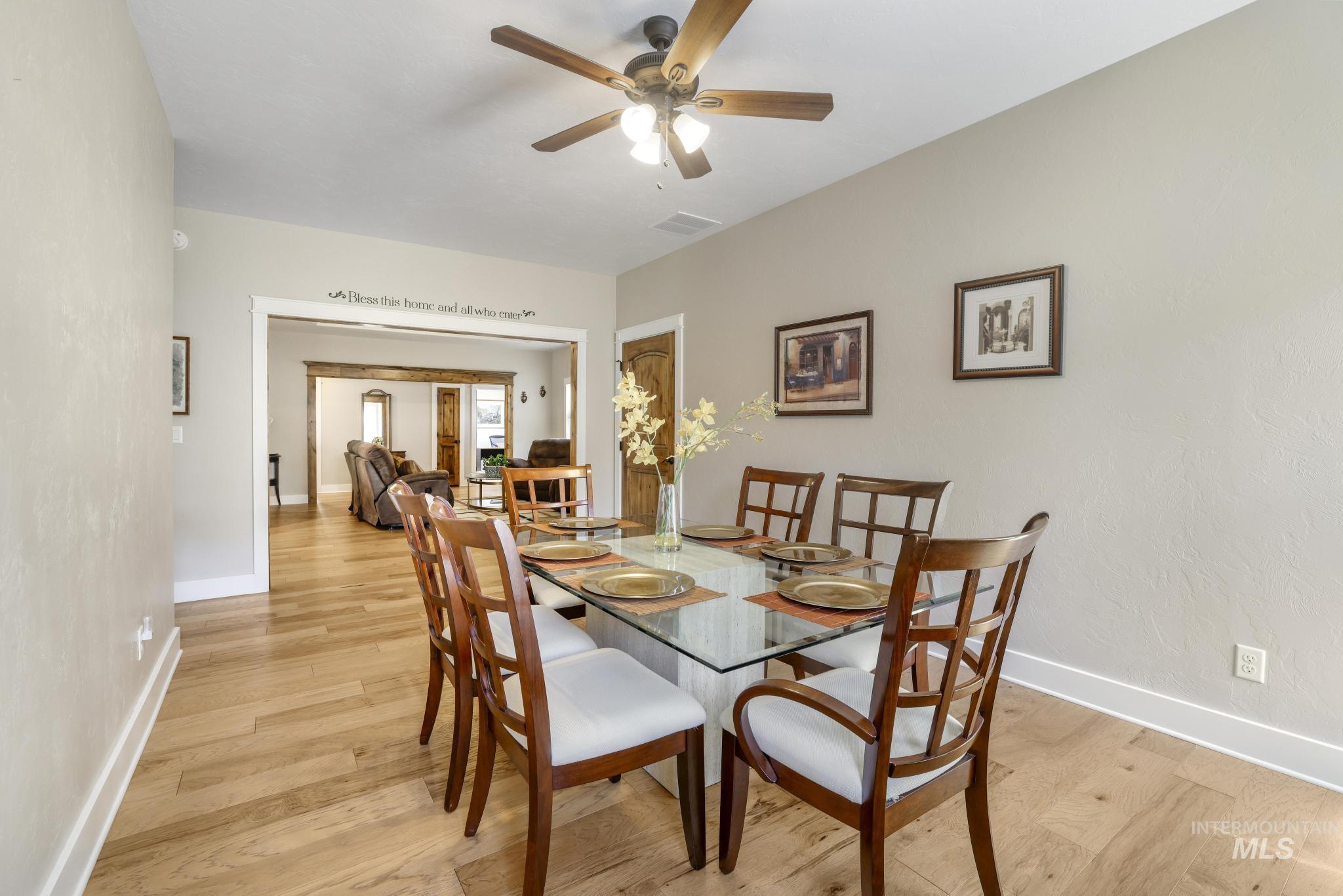 2157 Cayuse Street Twin Falls, ID 83301 - Photo 20 of 48 Dining room featuring light wood-style floors and a ceiling fan