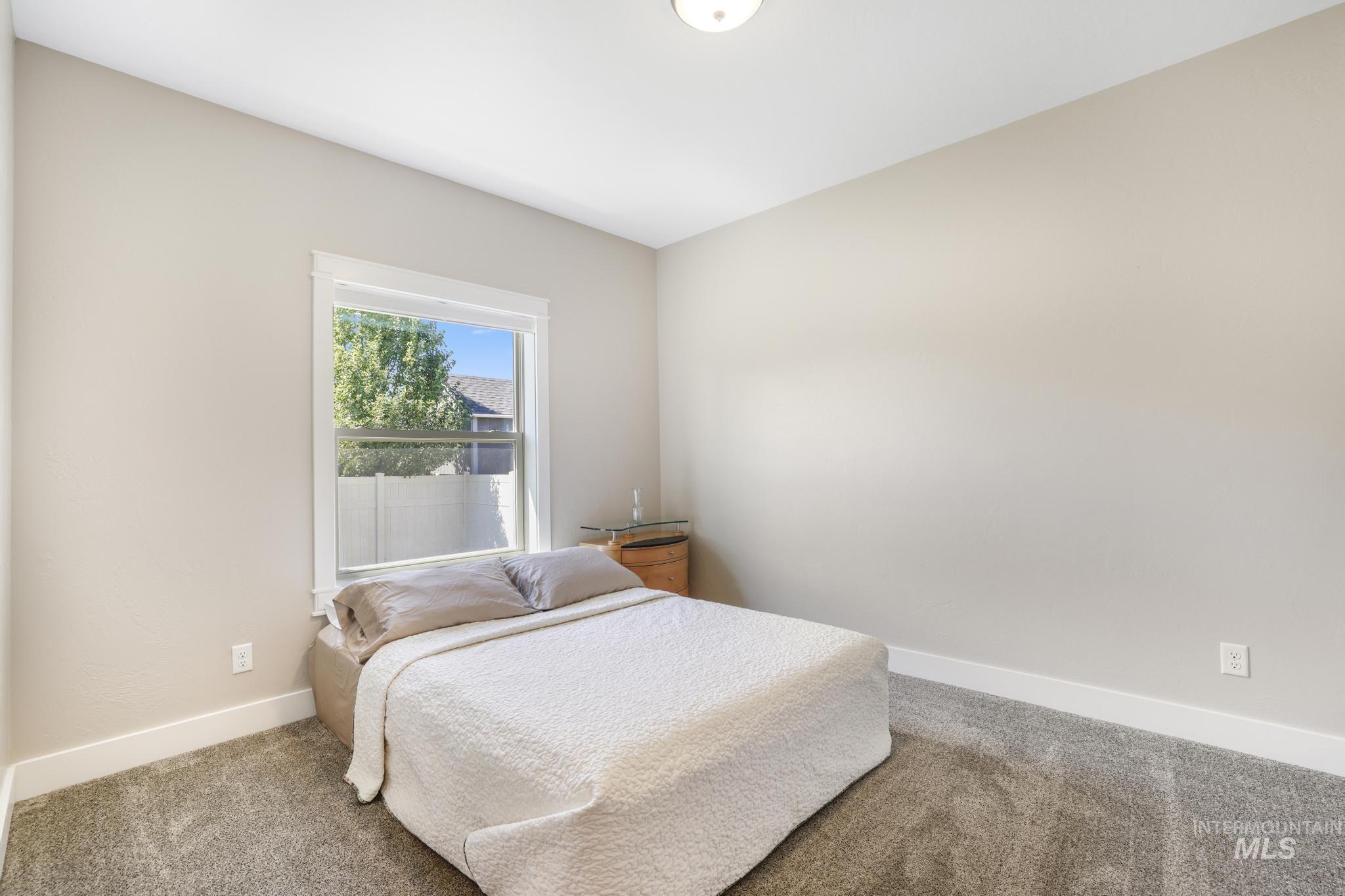 2157 Cayuse Street Twin Falls, ID 83301 - Photo 32 of 48 Bedroom featuring carpet