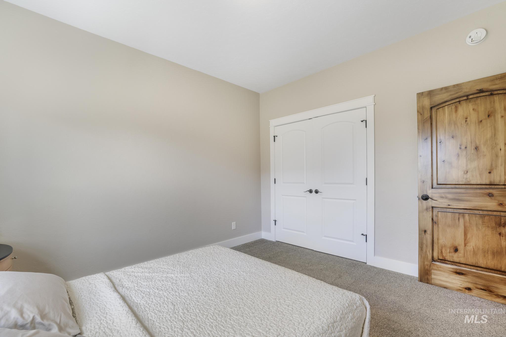2157 Cayuse Street Twin Falls, ID 83301 - Photo 33 of 48 Carpeted bedroom featuring baseboards and a closet