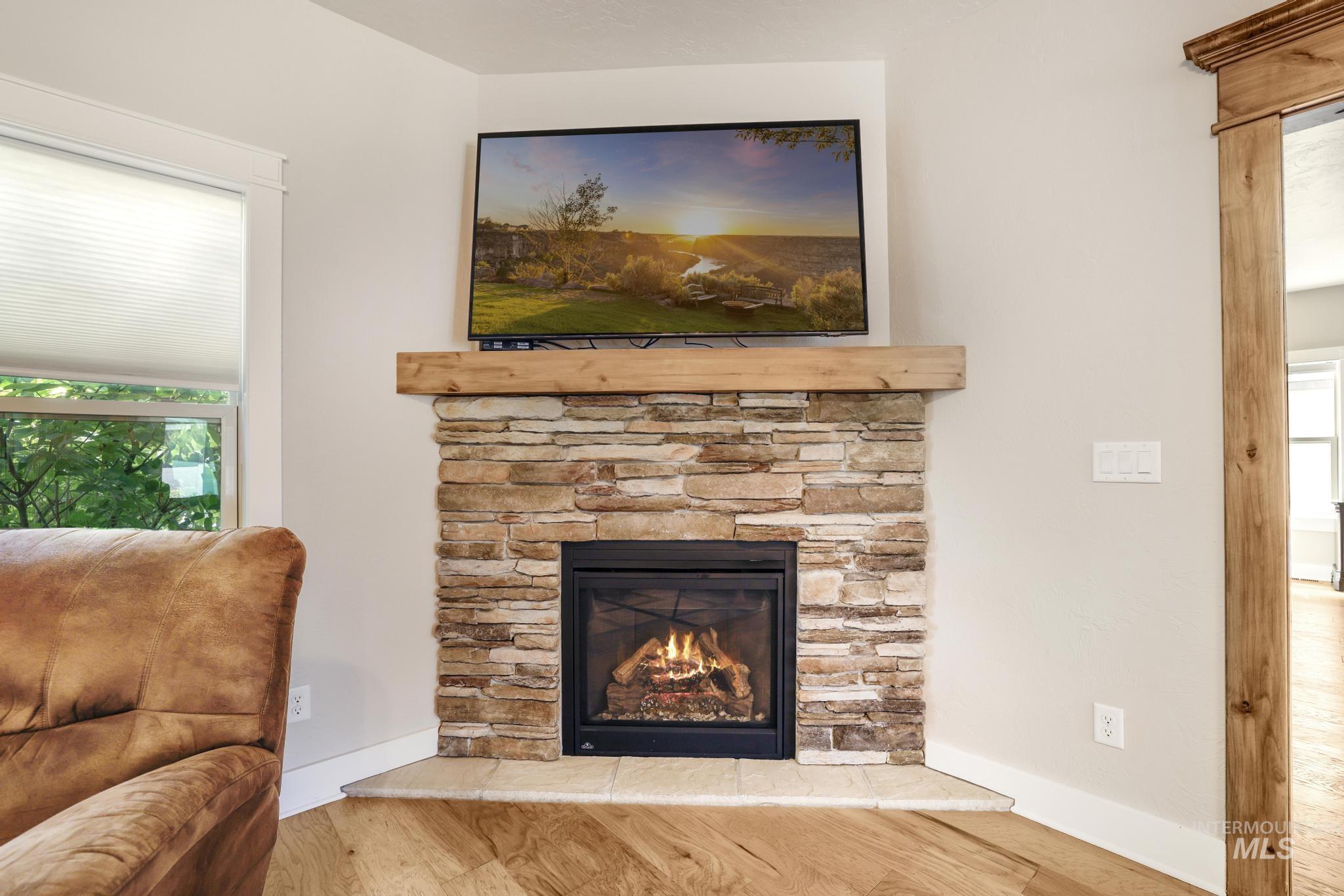 2157 Cayuse Street Twin Falls, ID 83301 - Photo 8 of 48 Detailed view of wood finished floors and a fireplace