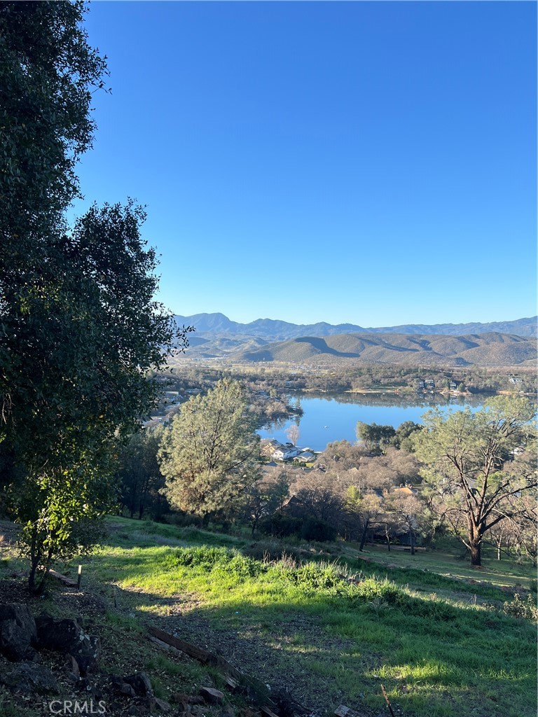 17282 Greenridge Road Hidden Valley Lake, CA 95467 - Photo 6 of 7 a view of a lake with a mountain in the background
