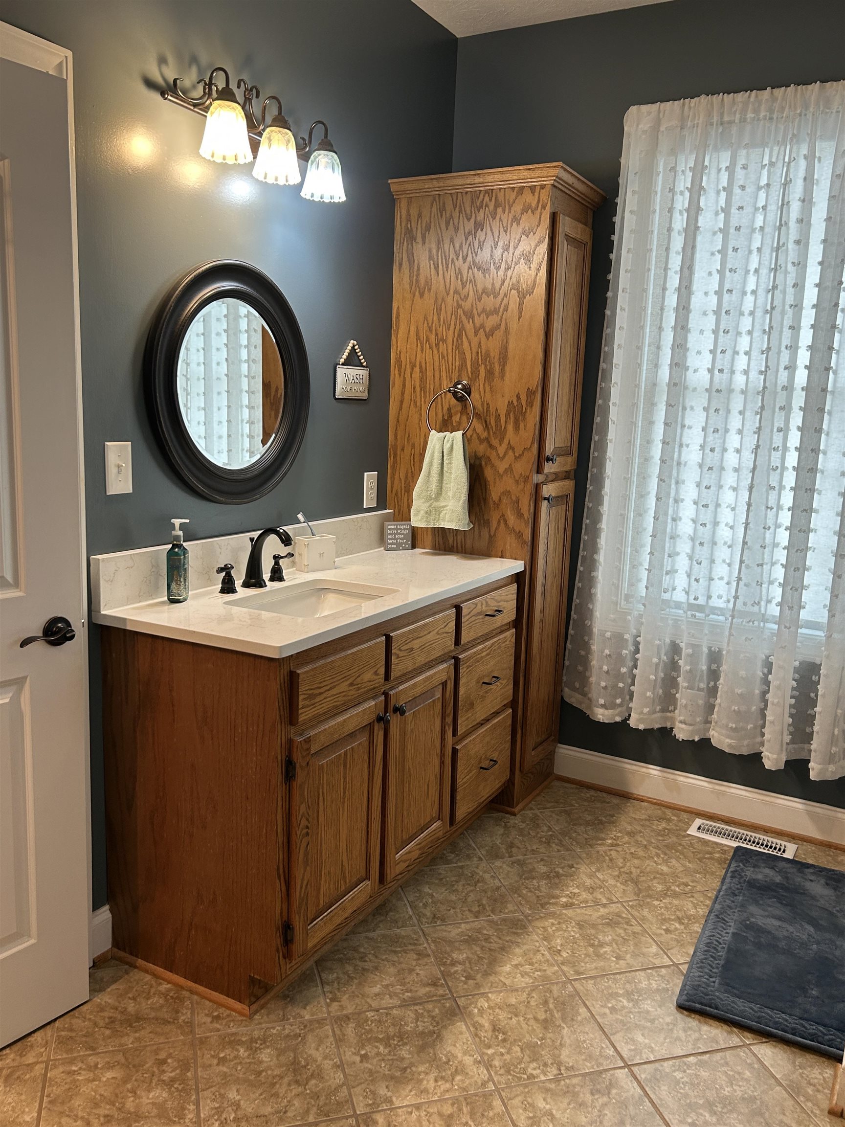 27 Slate Drive Stuarts Draft, VA 24477 - Photo 17 of 40 a bathroom with a sink mirror and a toilet