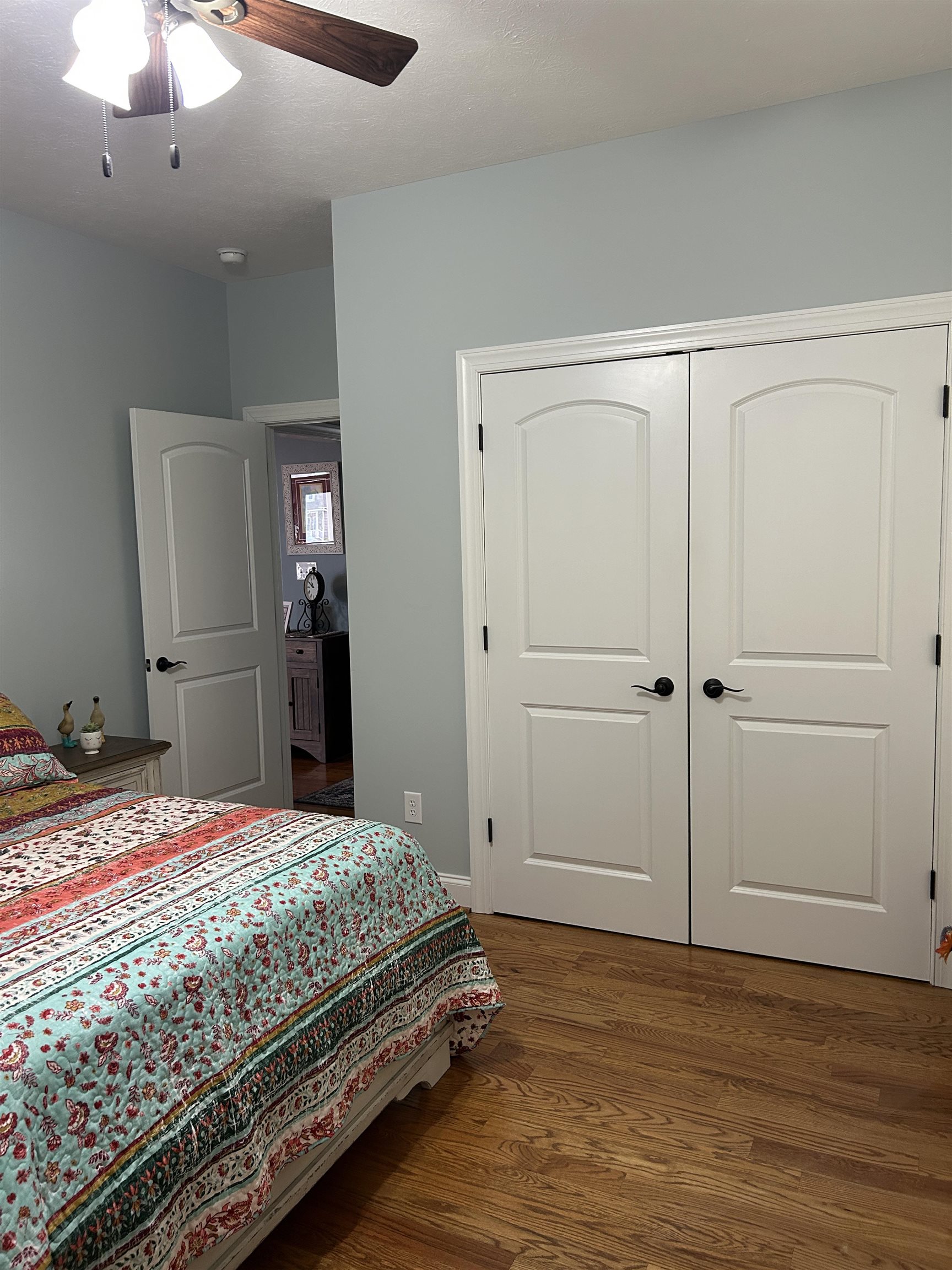 27 Slate Drive Stuarts Draft, VA 24477 - Photo 22 of 40 a bedroom with a bed and a chandelier
