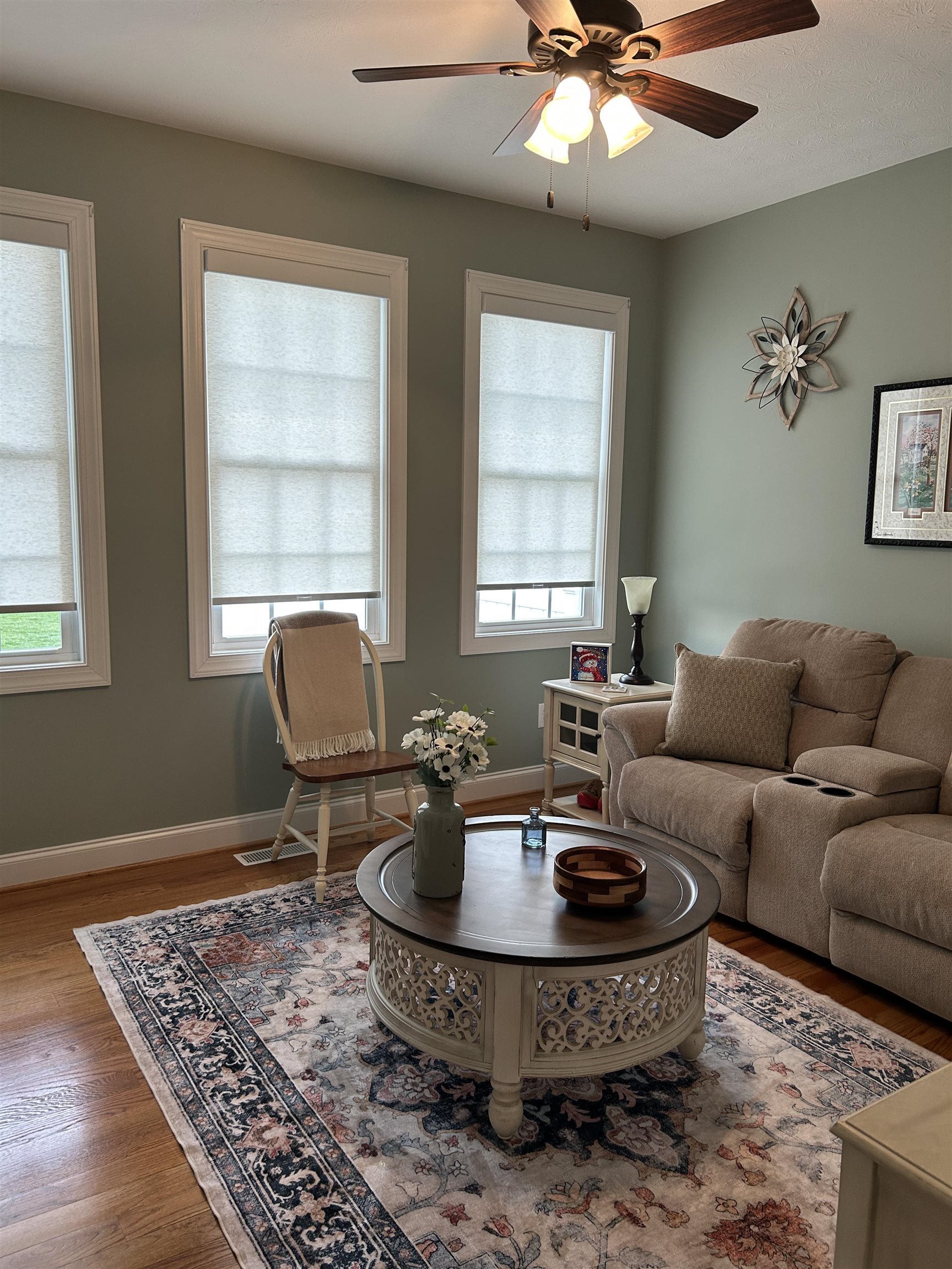 27 Slate Drive Stuarts Draft, VA 24477 - Photo 26 of 40 a living room with furniture a window and a chandelier
