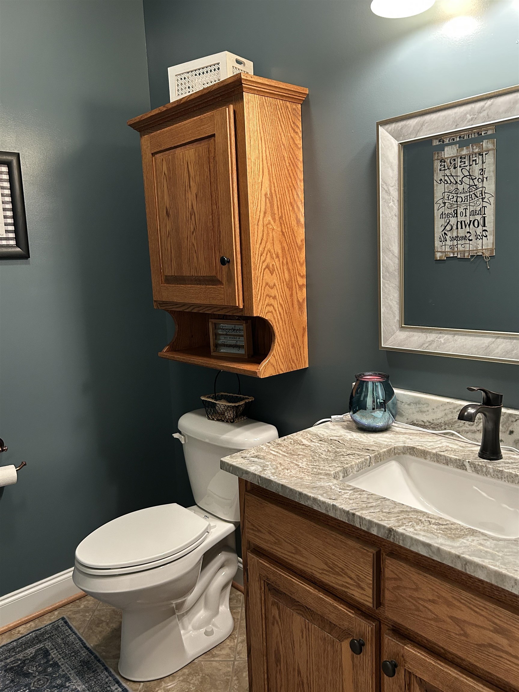 27 Slate Drive Stuarts Draft, VA 24477 - Photo 29 of 40 a bathroom with a granite countertop toilet sink and mirror