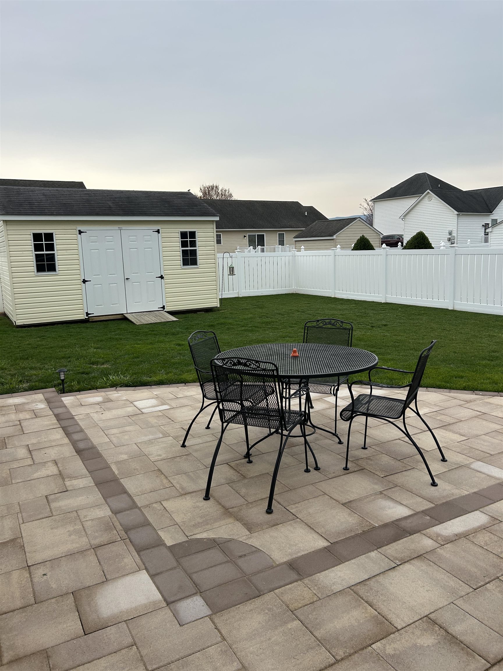 27 Slate Drive Stuarts Draft, VA 24477 - Photo 33 of 40 a view of a patio with a table and chairs in patio