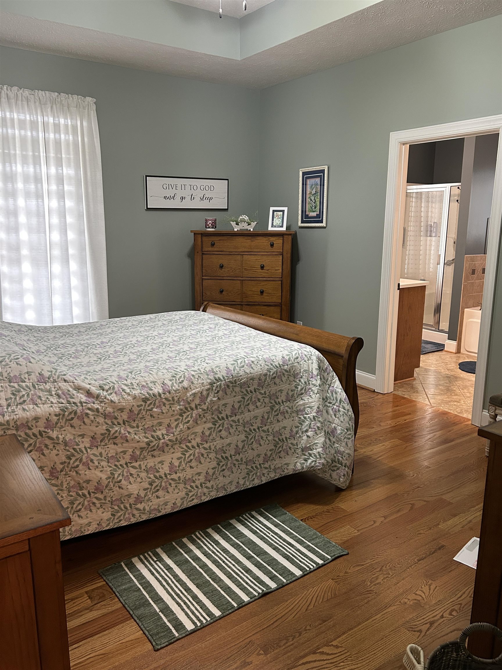 27 Slate Drive Stuarts Draft, VA 24477 - Photo 10 of 40 a bedroom with a bed and wooden floor