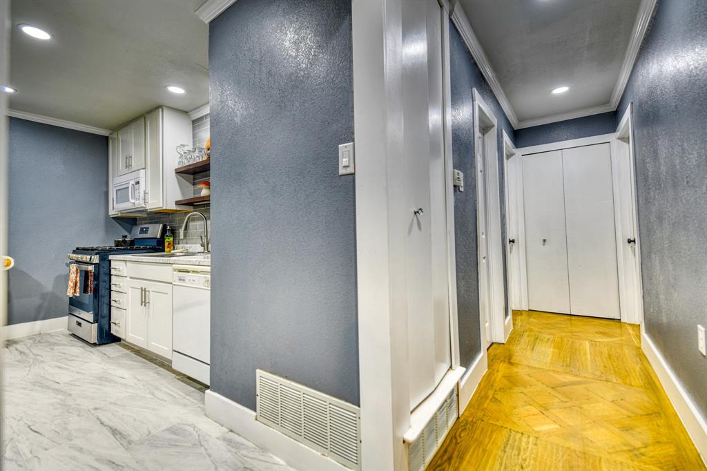 3214 Parker Street Irving, TX 75062 - Photo 13 of 22 a bathroom with a sink and a mirror