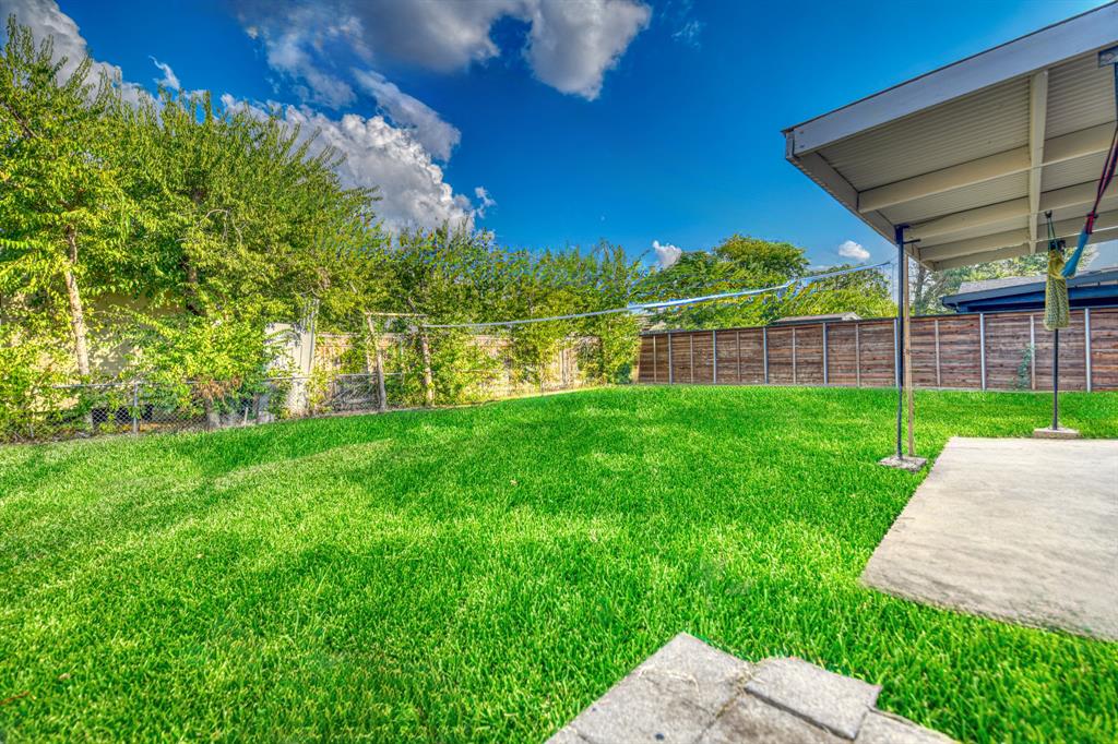 3214 Parker Street Irving, TX 75062 - Photo 20 of 22 a view of a backyard with a garden