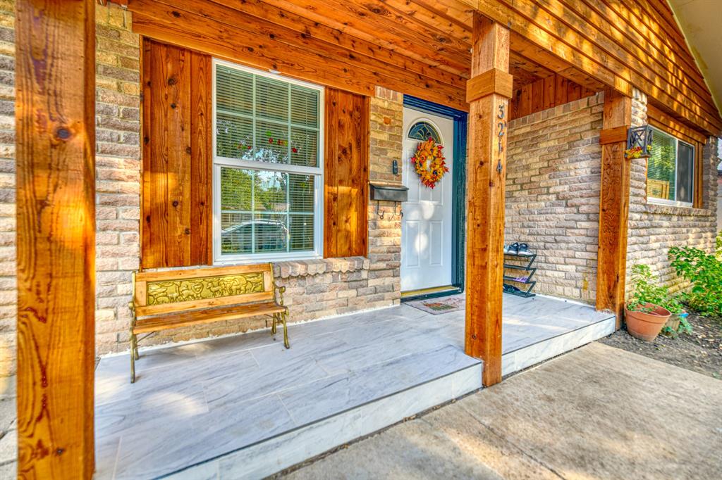 3214 Parker Street Irving, TX 75062 - Photo 3 of 22 a view of outdoor space besides a house