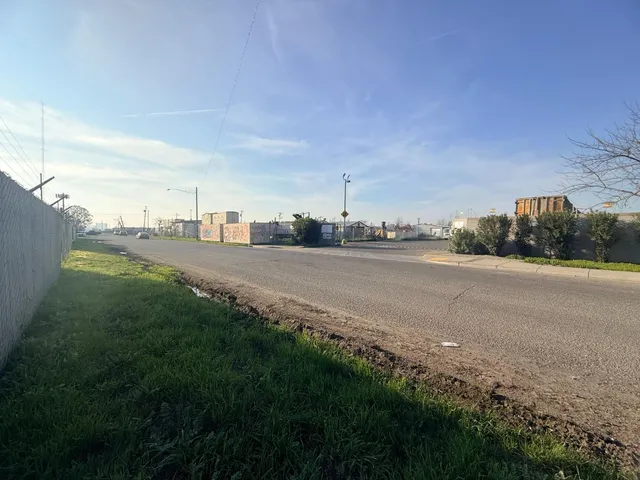 a view of a park with houses