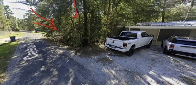a swimming pool with barbeque oven