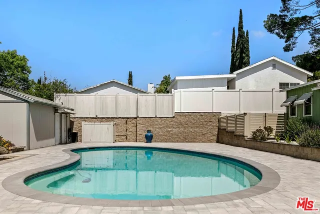 a view of a house with a swimming pool