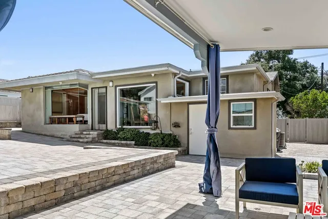 a view of a house with a patio