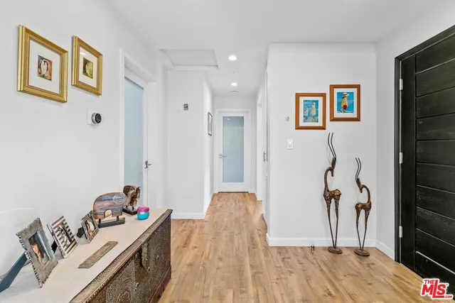 a view of a hallway with workspace