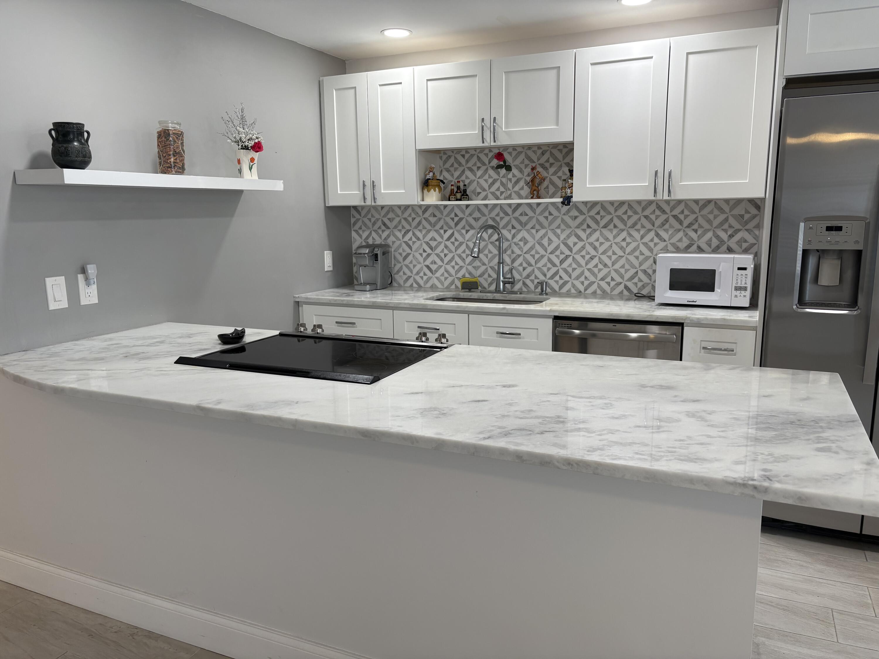 2084 Exeter, Unit 2084E Boca Raton, FL 33434 - Photo 2 of 18 IMG_3129