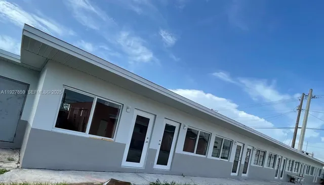 a view of an buildings from the balcony