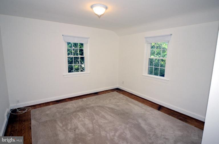 9610 Wire Avenue Silver Spring, MD 20901 - Photo 8 of 23 an empty room with a window
