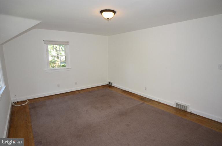 9610 Wire Avenue Silver Spring, MD 20901 - Photo 10 of 23 an empty room with a window