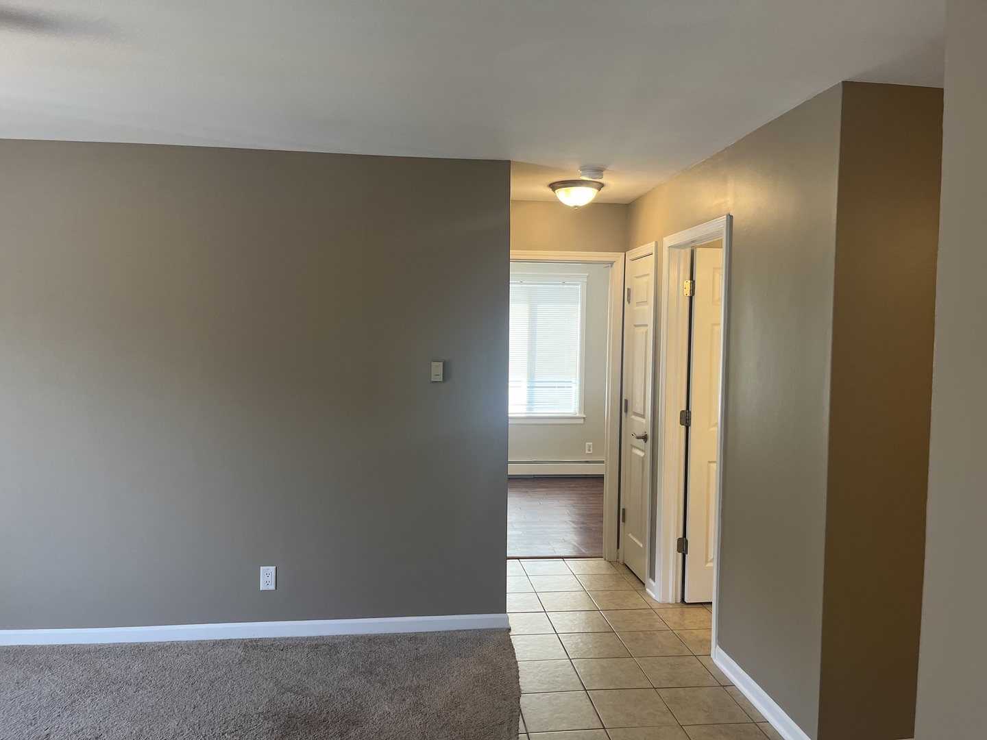2300 Light Road, Unit 201 Oswego, IL 60543 - Photo 6 of 10 a bathroom with a shower and a glass door