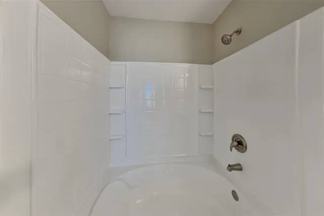 a close up of a bathtub