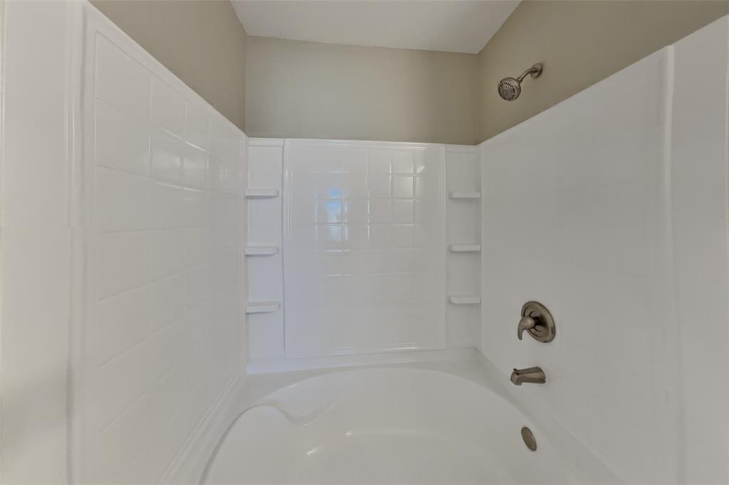 5804 Mirror Ridge Drive Fort Worth, TX 76179 - Photo 11 of 19 a close up of a bathtub
