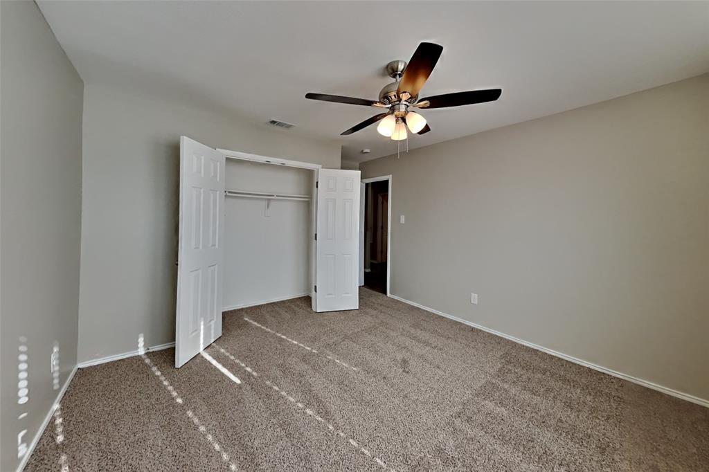5804 Mirror Ridge Drive Fort Worth, TX 76179 - Photo 13 of 19 a view of room with ceiling fan and window