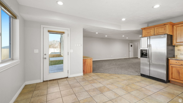 45 North 970 W Street Orem, UT 84057 - Photo 28 of 45 Basement kitchen and outside entrance and patio.