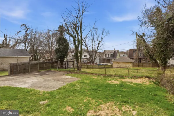 a view of backyard with green space