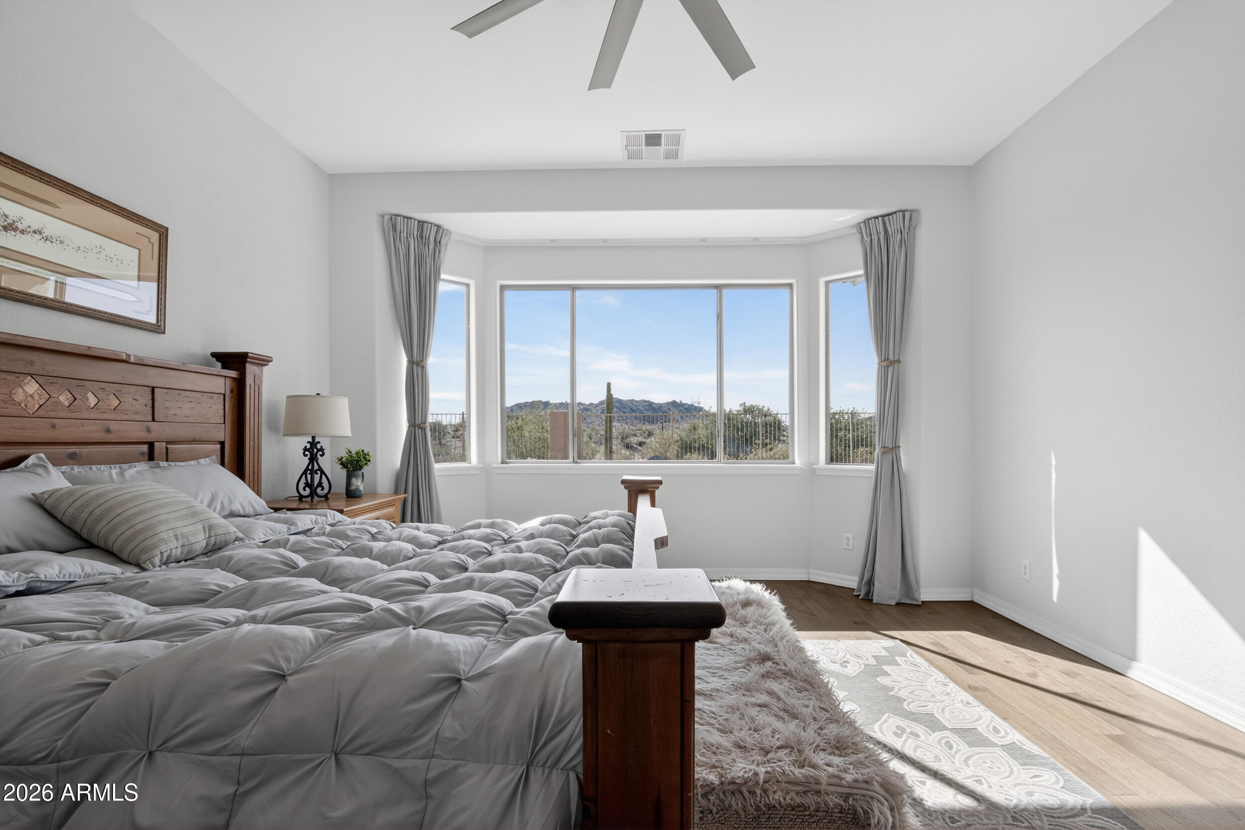 18377 Verdin Road Goodyear, AZ 85338 - Photo 11 of 55 a bedroom with a bed and a window