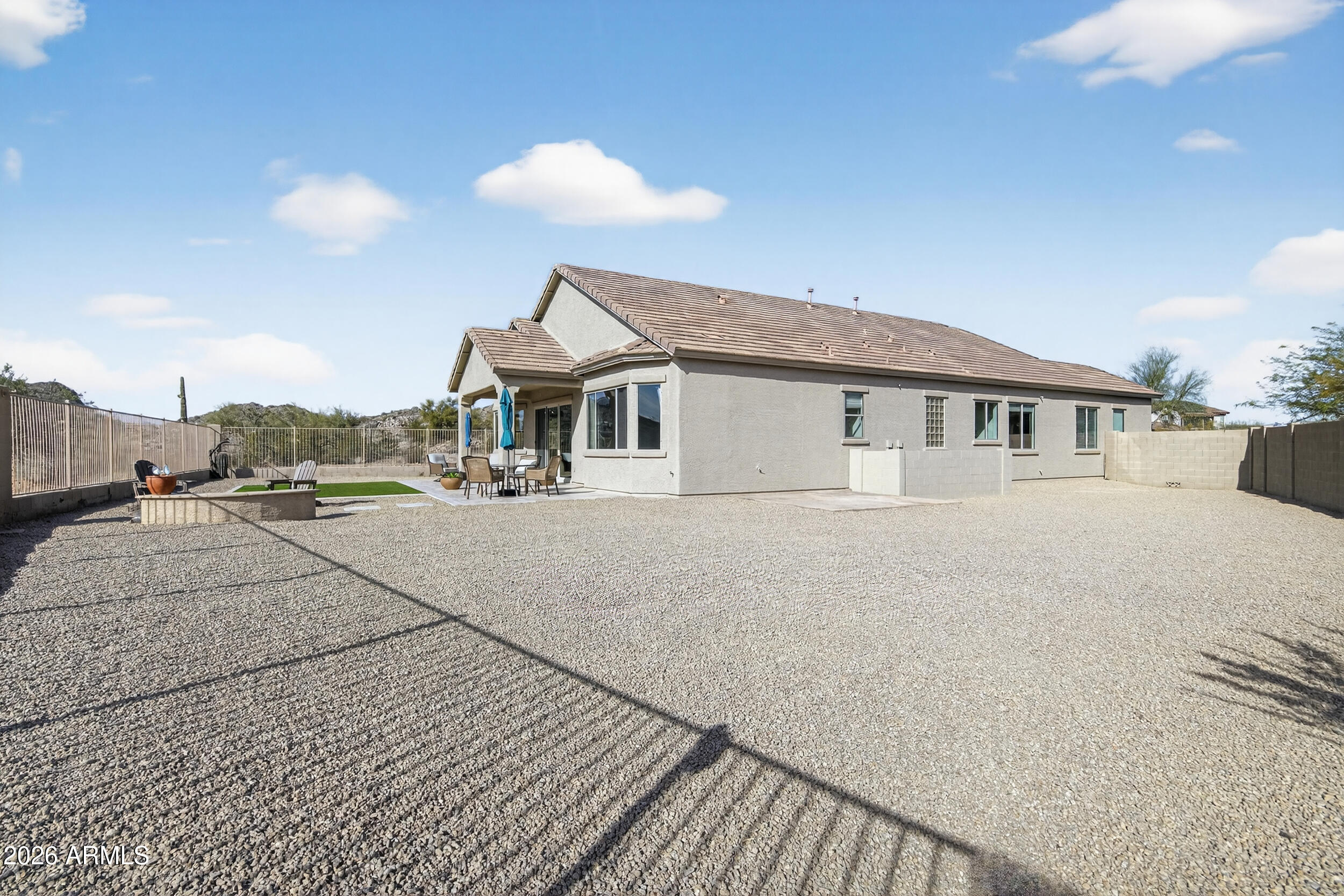 18377 Verdin Road Goodyear, AZ 85338 - Photo 26 of 55 a house with a outdoor space