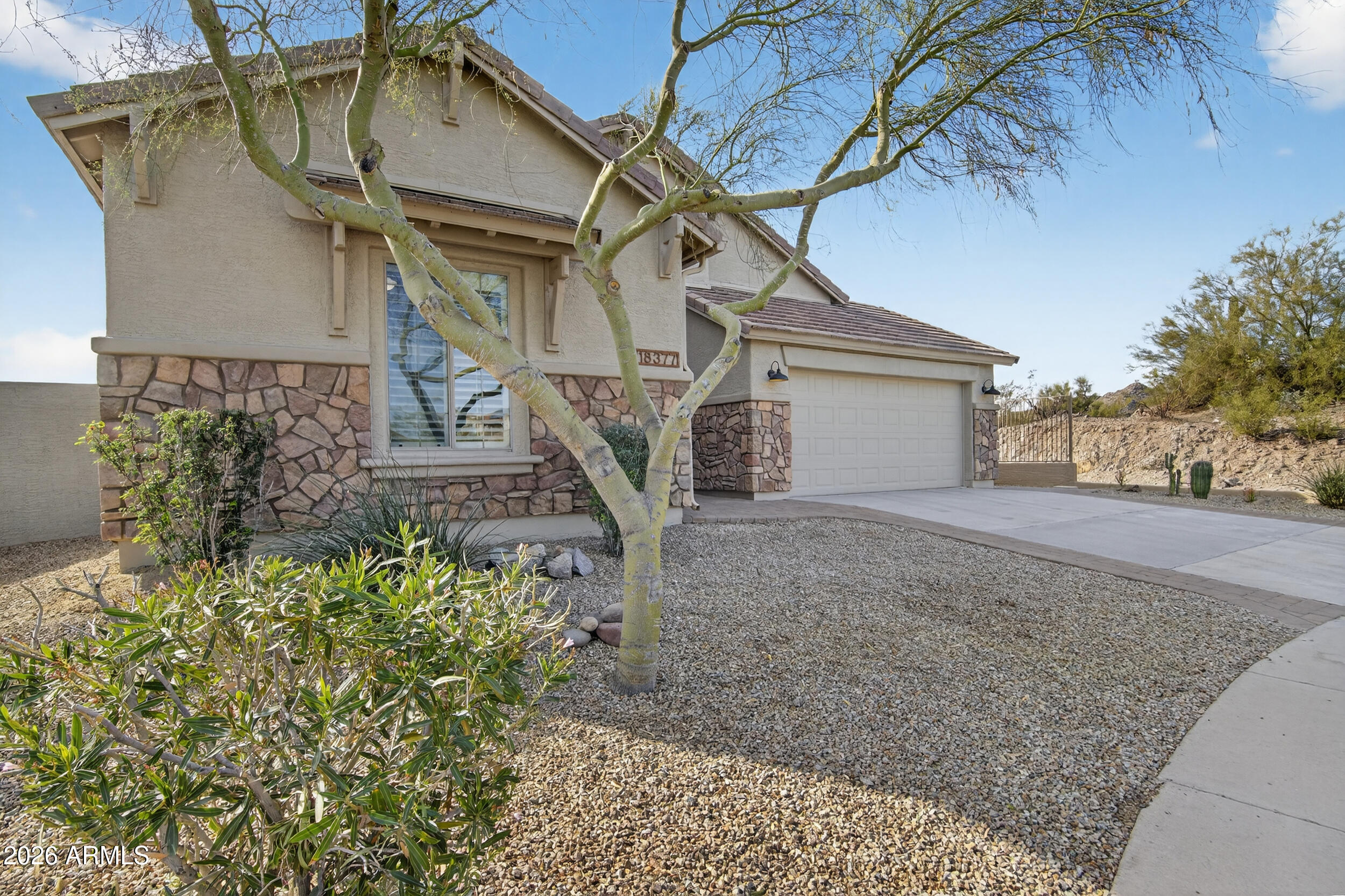 18377 Verdin Road Goodyear, AZ 85338 - Photo 2 of 55 a house with a tree in front of it