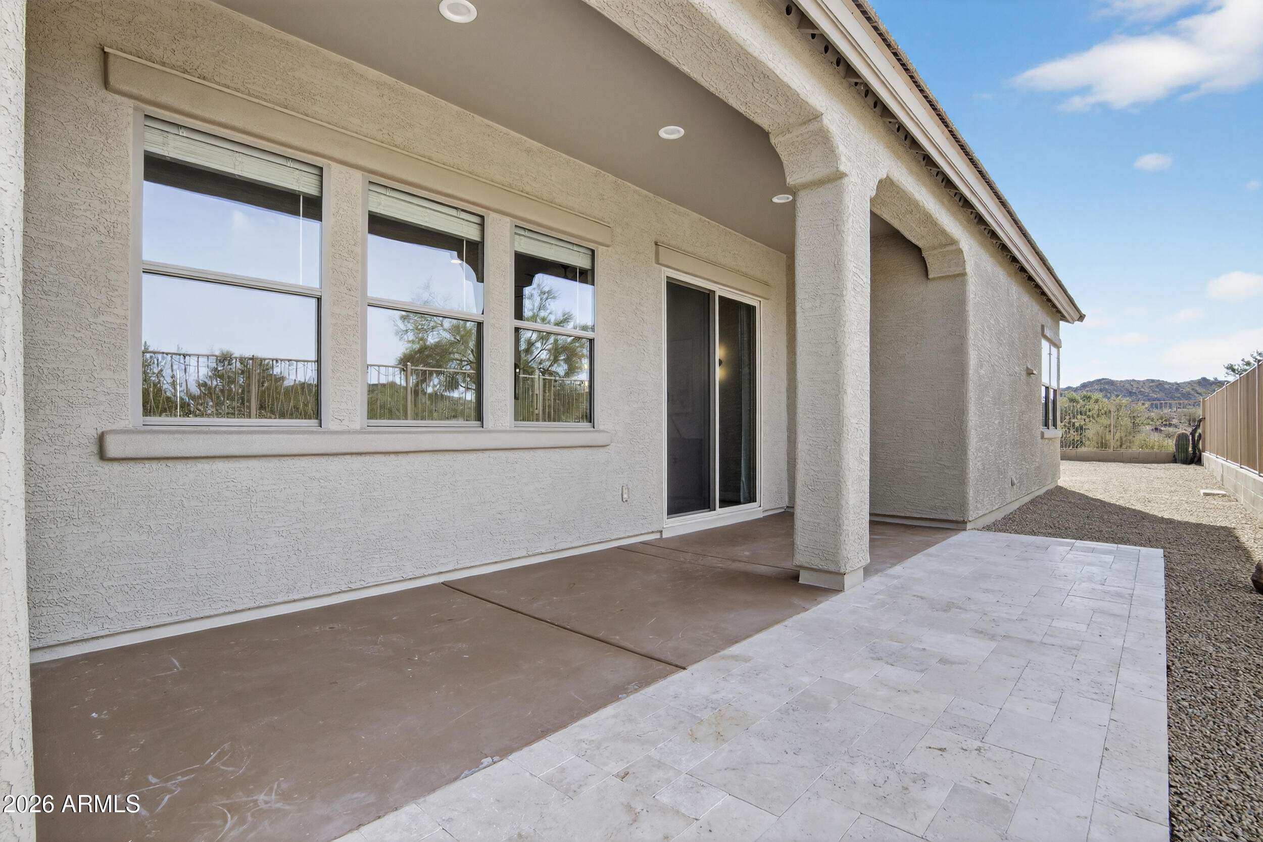 18377 Verdin Road Goodyear, AZ 85338 - Photo 30 of 55 a view of an empty room with a window