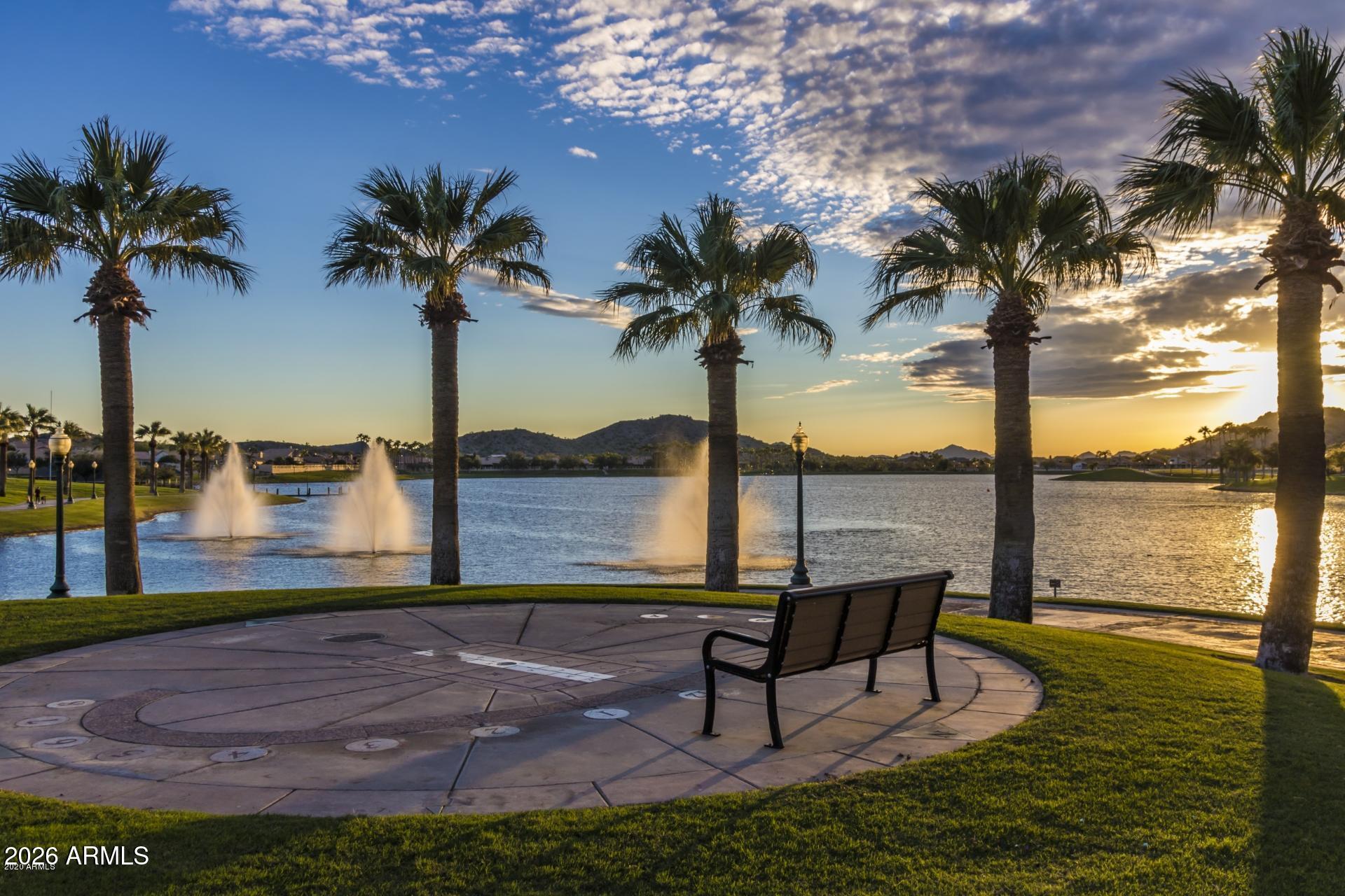 18377 Verdin Road Goodyear, AZ 85338 - Photo 42 of 55 a view of a ocean with a table and chairs