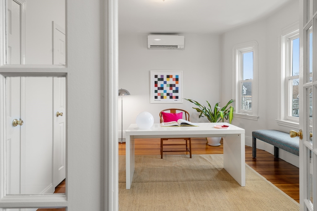 206 Pearl Street, Unit 3 Somerville, MA 02145 - Photo 6 of 18 a room with toys and a window