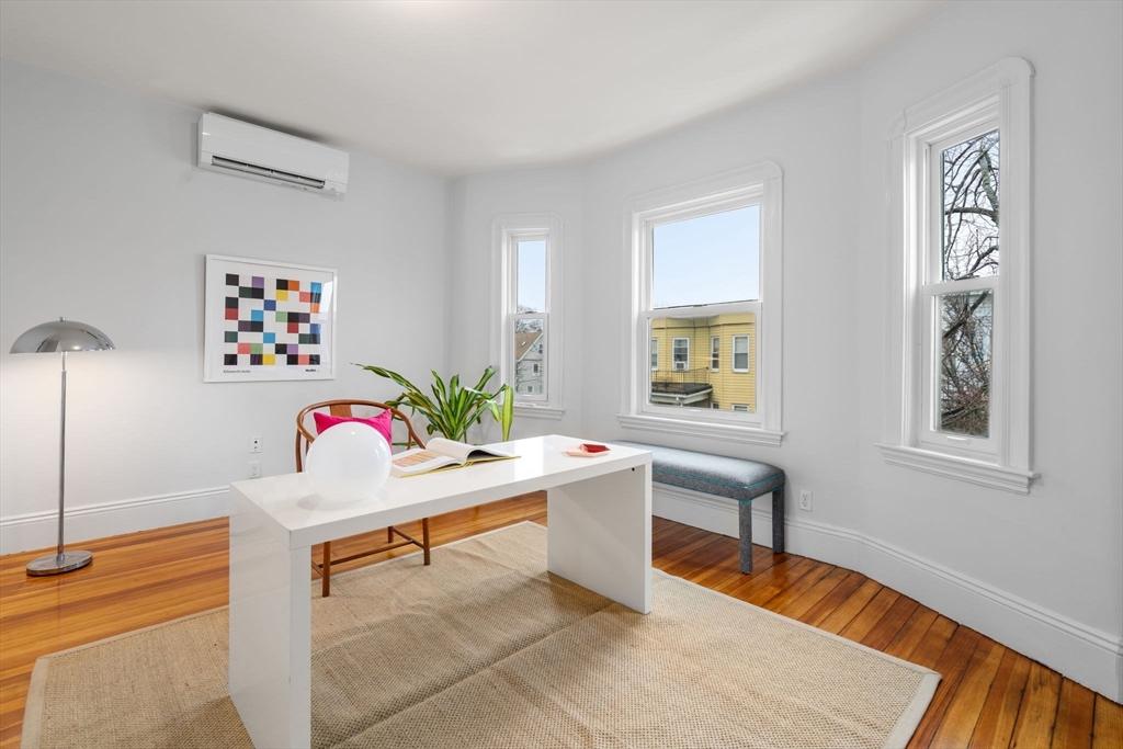 206 Pearl Street, Unit 3 Somerville, MA 02145 - Photo 7 of 18 a workspace with furniture and window