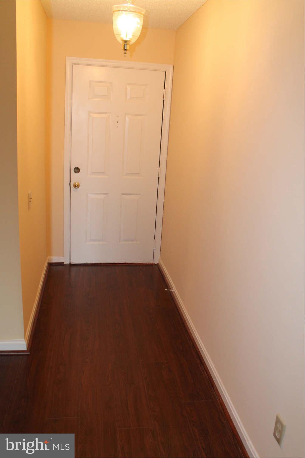 12004 Golf Ridge Court, Unit 102 Fairfax, VA 22033 - Photo 6 of 24 Foyer