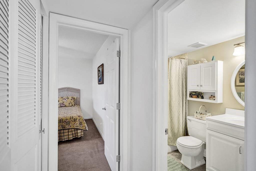 303 North Riverside Drive, Unit 503 Pompano Beach, FL 33062 - Photo 14 of 29 a bathroom with a toilet sink and tub