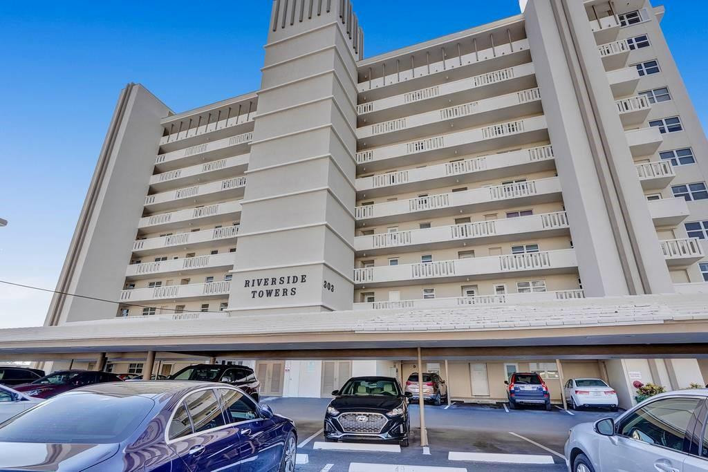 303 North Riverside Drive, Unit 503 Pompano Beach, FL 33062 - Photo 19 of 29 a view of a car park in front of building