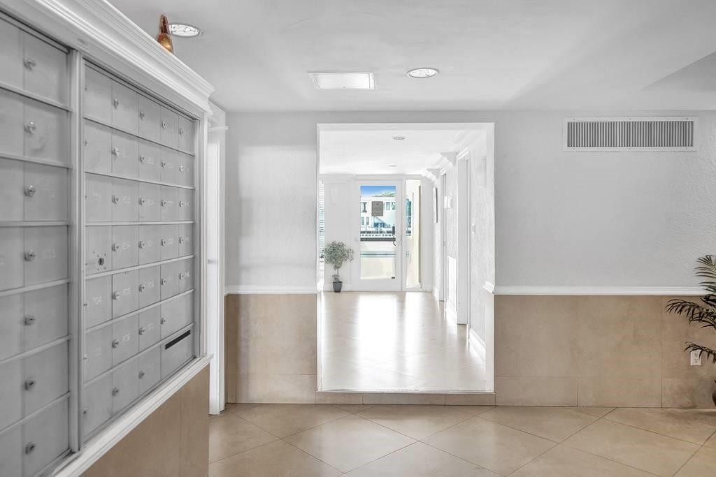 303 North Riverside Drive, Unit 503 Pompano Beach, FL 33062 - Photo 23 of 29 wooden floor in an empty room