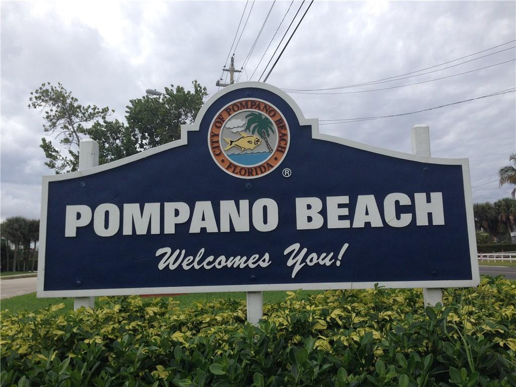 303 North Riverside Drive, Unit 503 Pompano Beach, FL 33062 - Photo 25 of 29 a sign broad in front of a building
