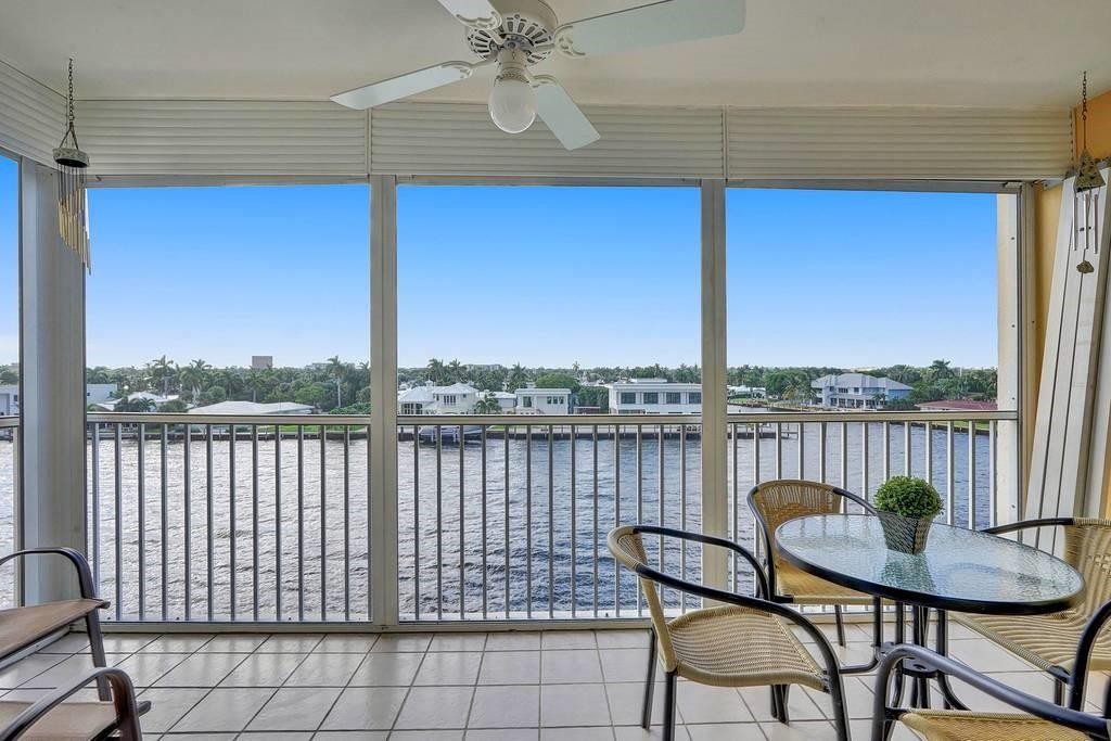 303 North Riverside Drive, Unit 503 Pompano Beach, FL 33062 - Photo 9 of 29 a view of a chair and table on the roof deck